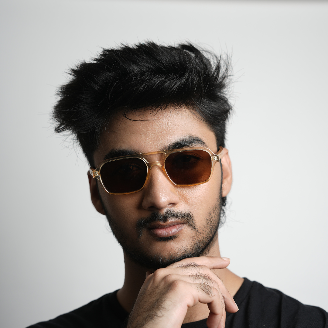 A pair of Monkstory Retro Wood Polarized Unisex sunglasses with transparent brown lenses on a white background.