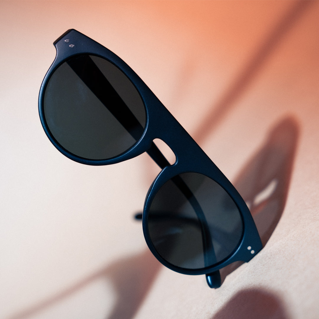 Monkstory's Bold Aviator Unisex Sunglasses in black with UV400 protection and green lenses.