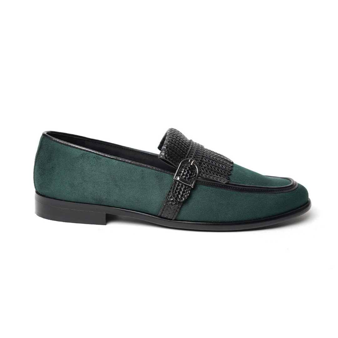 A Monkstory woven fringed slip-on with a bottle green suede and black buckle.