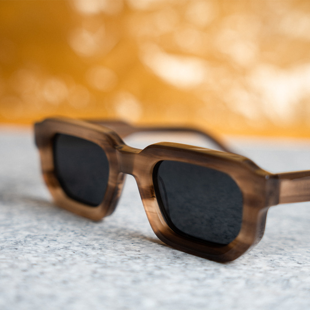 These monkstory sunglasses feature a sleek wooden frame, offering a unique and stylish look. With black lenses that provide UV 400 protection, not only do these sunglasses exude a retro vibe but also
