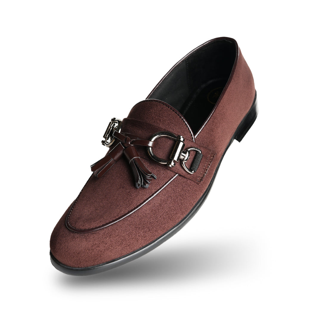 A timeless Monkstory brown loafer with tassels and a buckle, exuding modern sophistication.