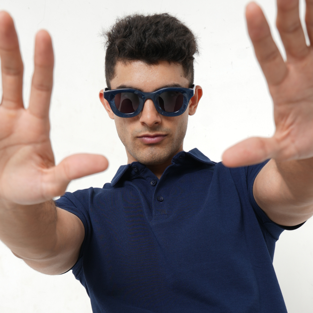 A pair of MonkStory Thick Acetate Unisex Sunglasses - Marbleous Blue on a white background.