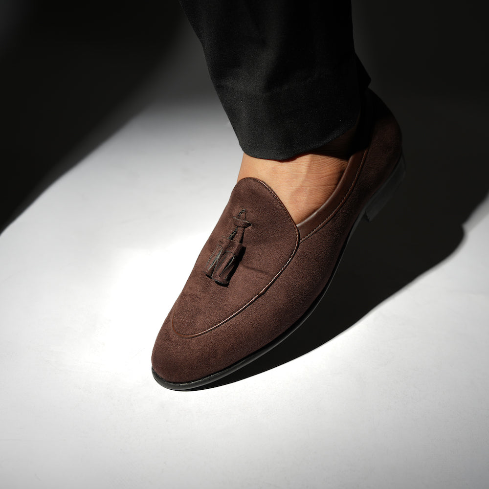 Monkstory Tassel Slip-Ons - Brown, an eco-conscious burgundy suede loafer with tassels made from vegan leather.