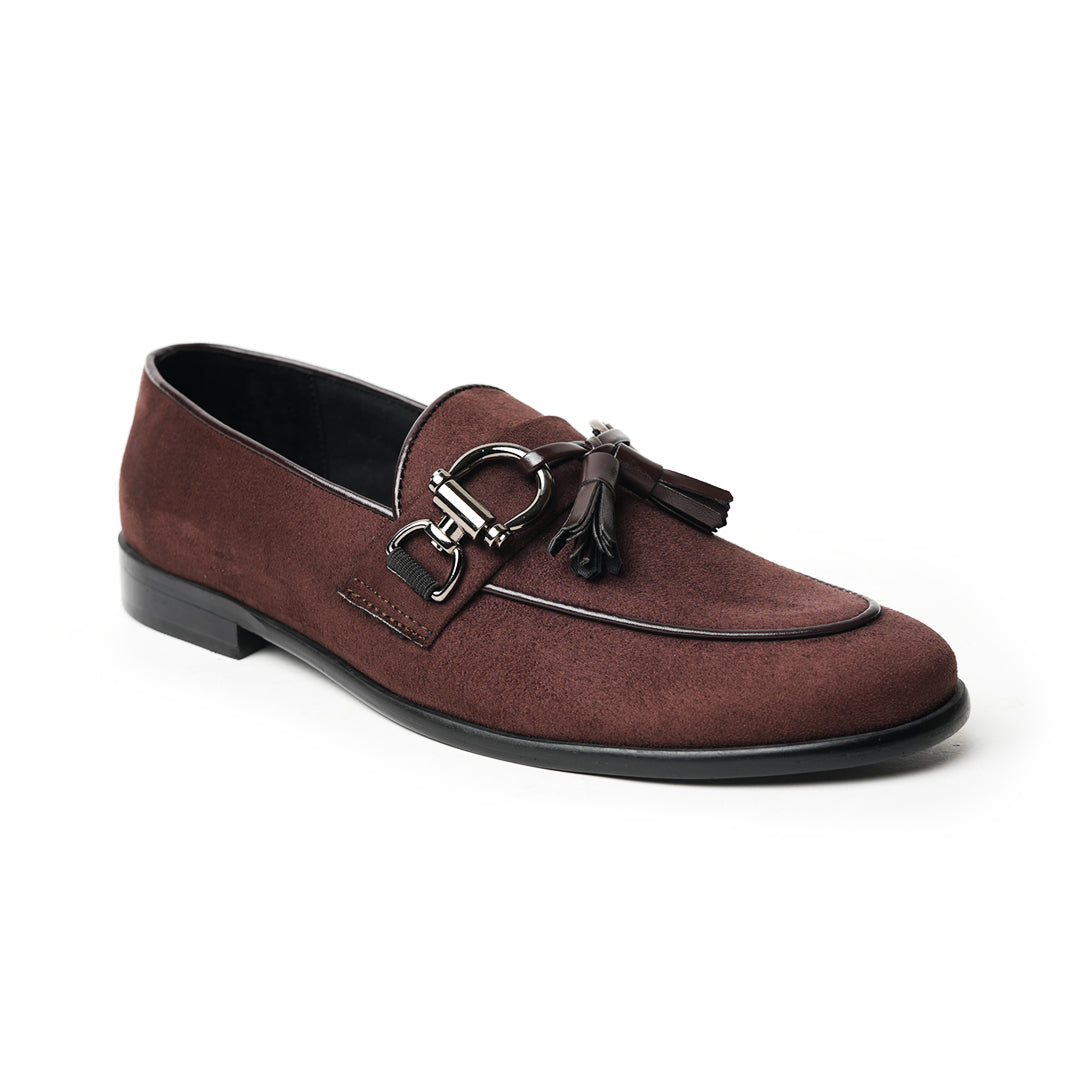 A timeless Monkstory brown loafer with tassels and a buckle, exuding modern sophistication.