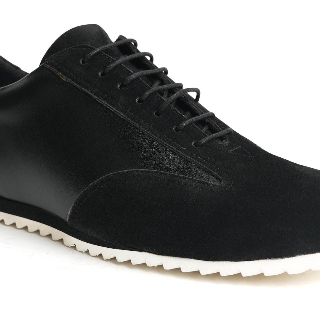 The Monkstory Black Dual-Tone Smart Sneakers combine sleek style with unparalleled comfort.