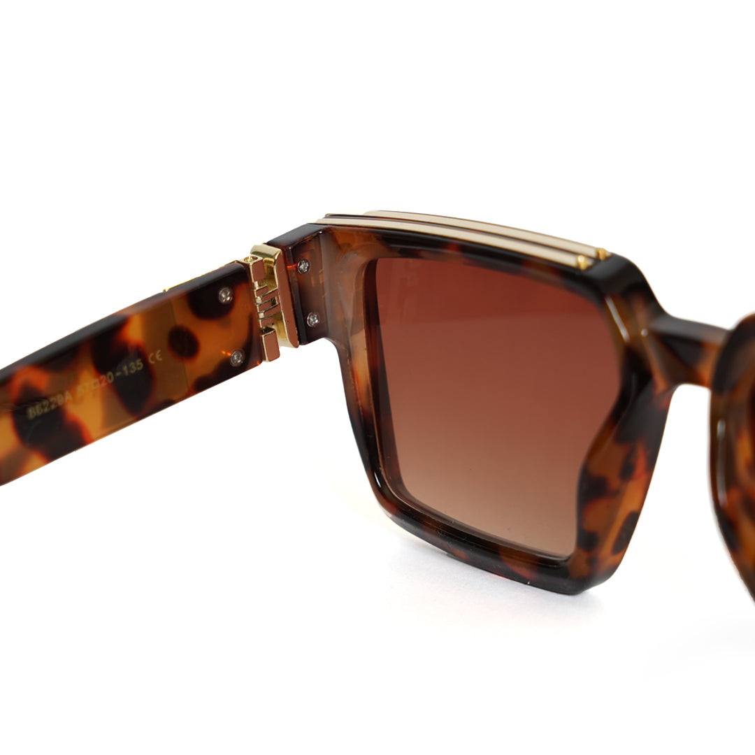 A pair of Monkstory Millionaire Unisex Wayfarer Sunglasses - Tortoise with polarized lenses.