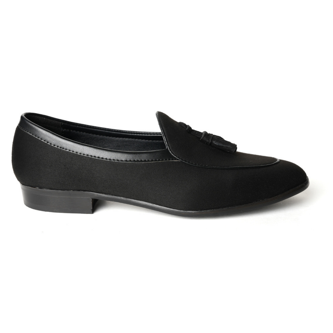 A Monkstory Tassel Slip-Ons - Black, a vegan leather loafer, with tassel on the side.