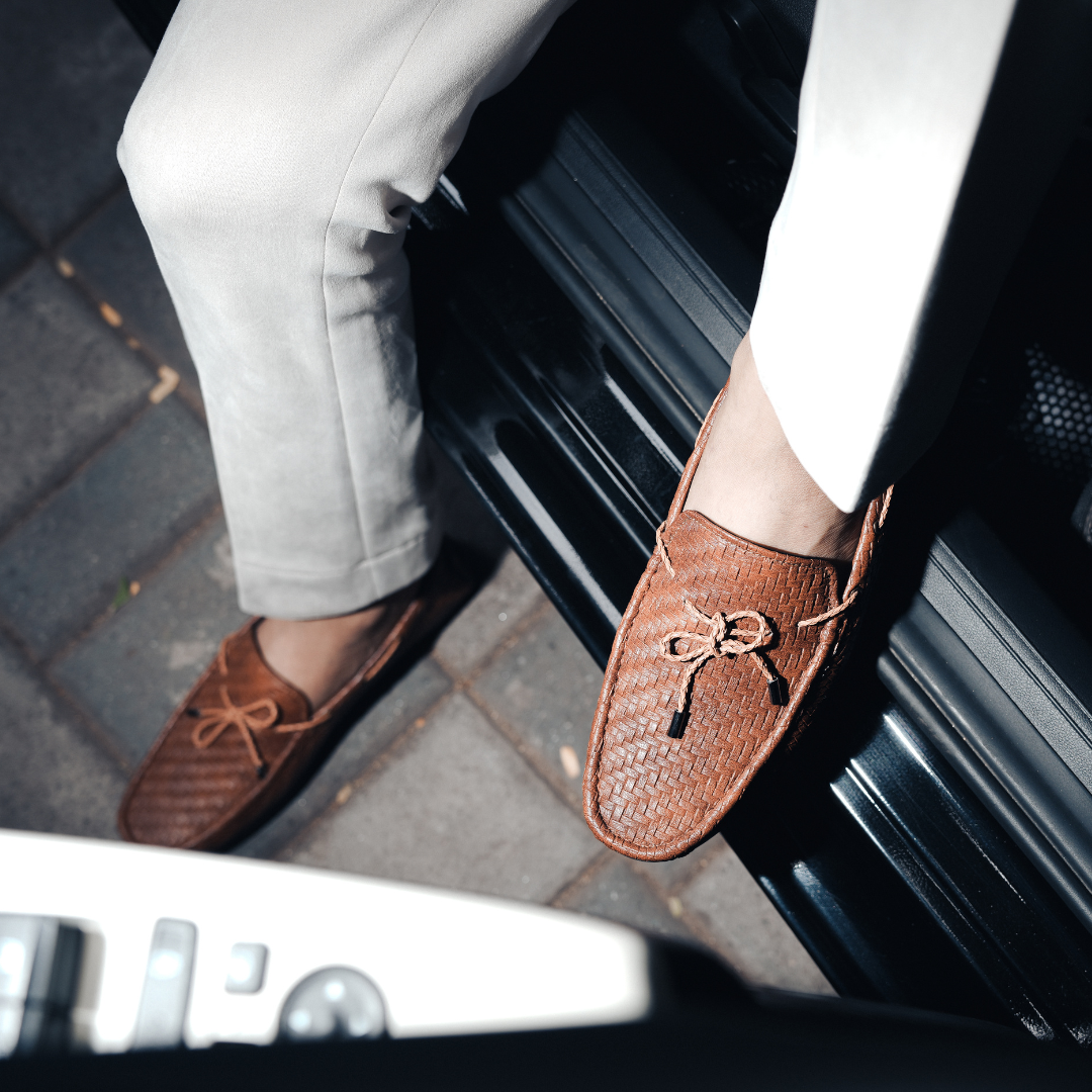 A fashionable men's Monkstory brown loafer with tassels, combining style and comfort.