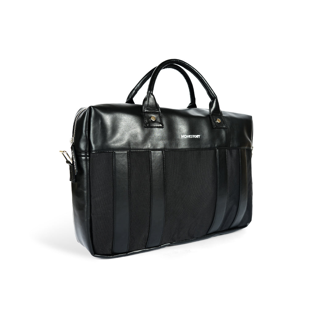 A Monkstory Timeless Laptop Bag - Black with storage options on a white background.
