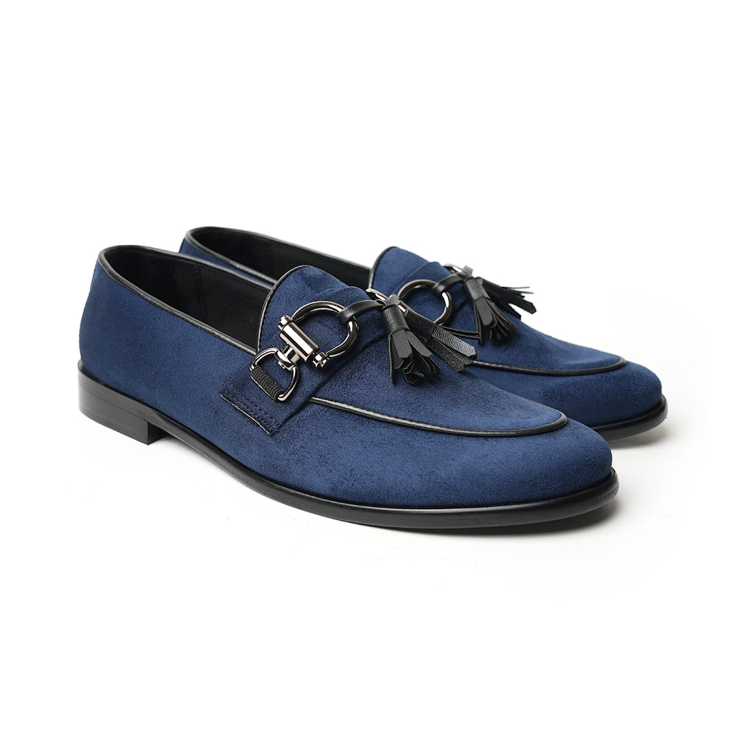 A classic Monkstory Horse-bit Tasseled Slip-Ons blue loafer exuding modern sophistication.