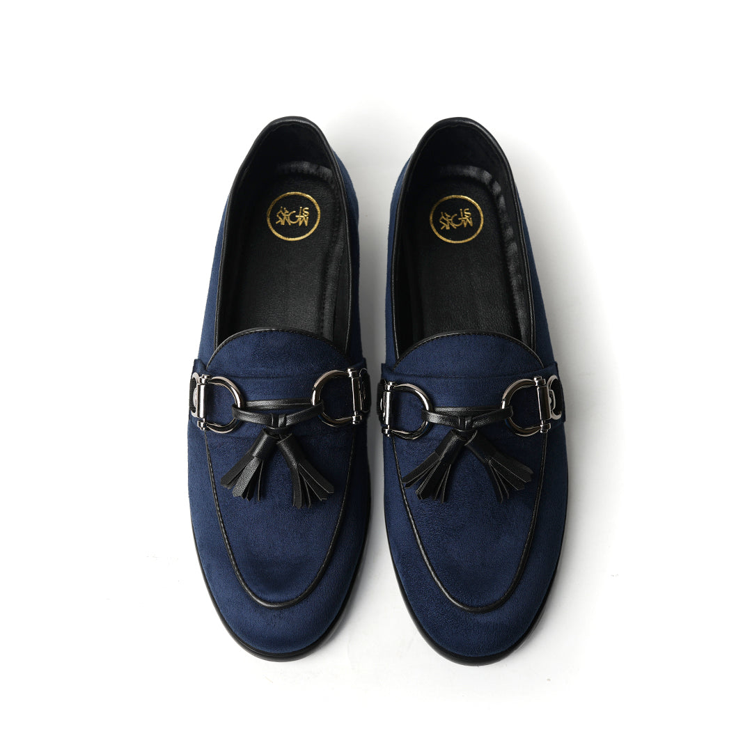 A classic Monkstory Horse-bit Tasseled Slip-Ons blue loafer exuding modern sophistication.