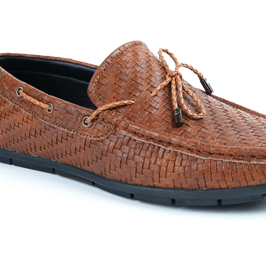 A fashionable men's Monkstory brown loafer with tassels, combining style and comfort.