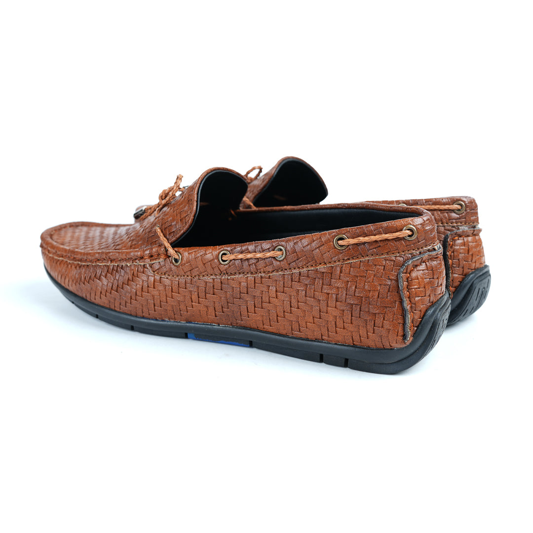 A fashionable men's Monkstory brown loafer with tassels, combining style and comfort.