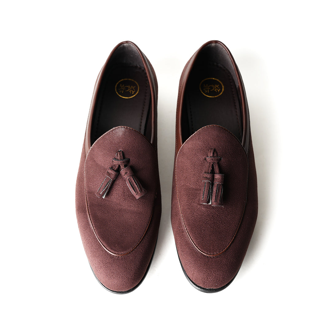 Monkstory Tassel Slip-Ons - Brown, an eco-conscious burgundy suede loafer with tassels made from vegan leather.