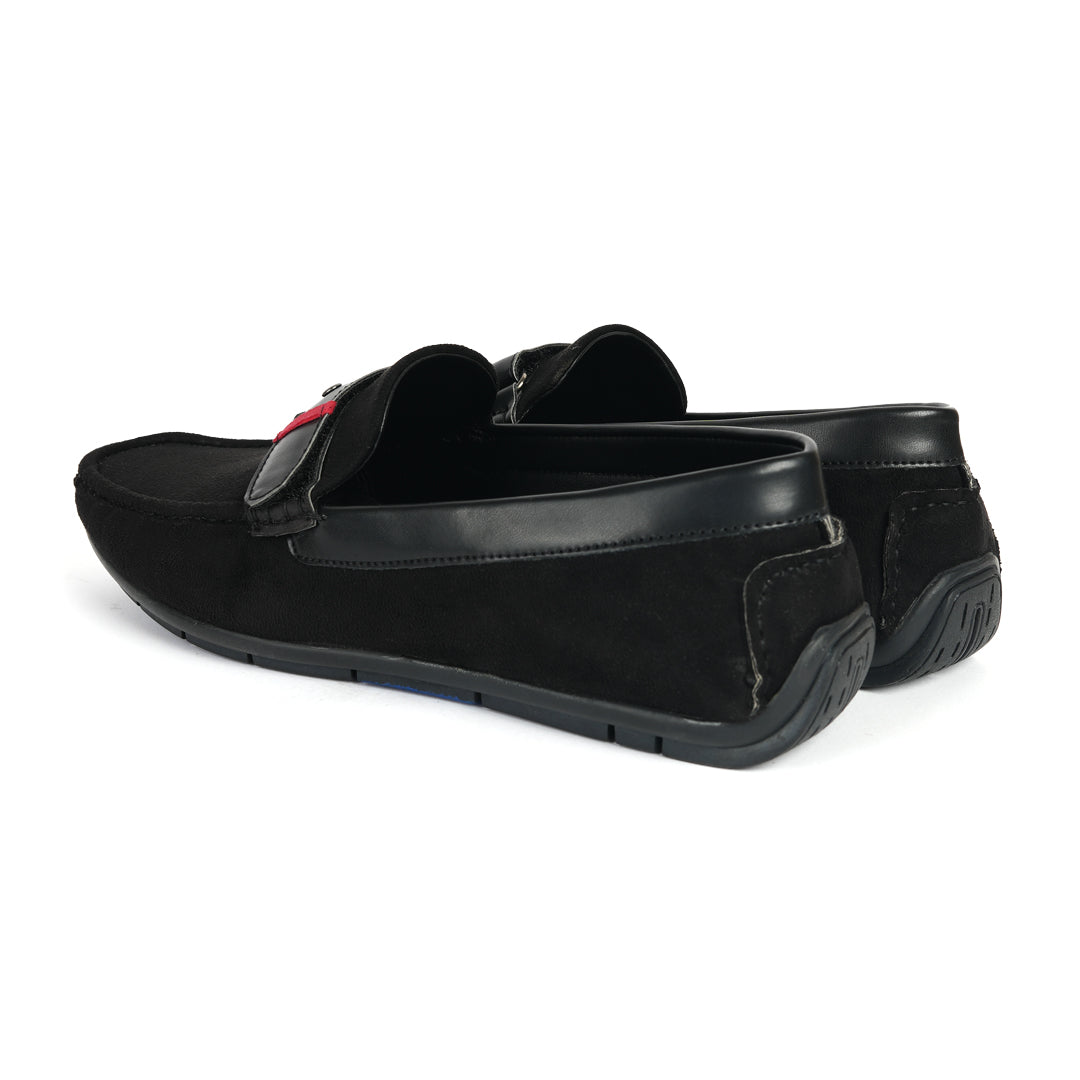 A comfortable Monkstory black loafer with a red stripe, perfect for driving.