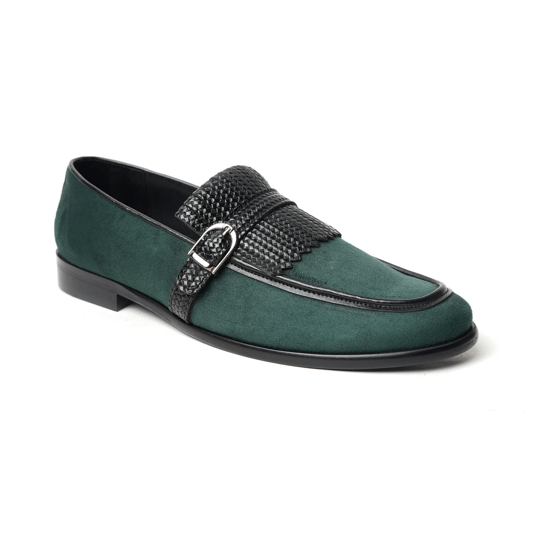 A Monkstory woven fringed slip-on with a bottle green suede and black buckle.
