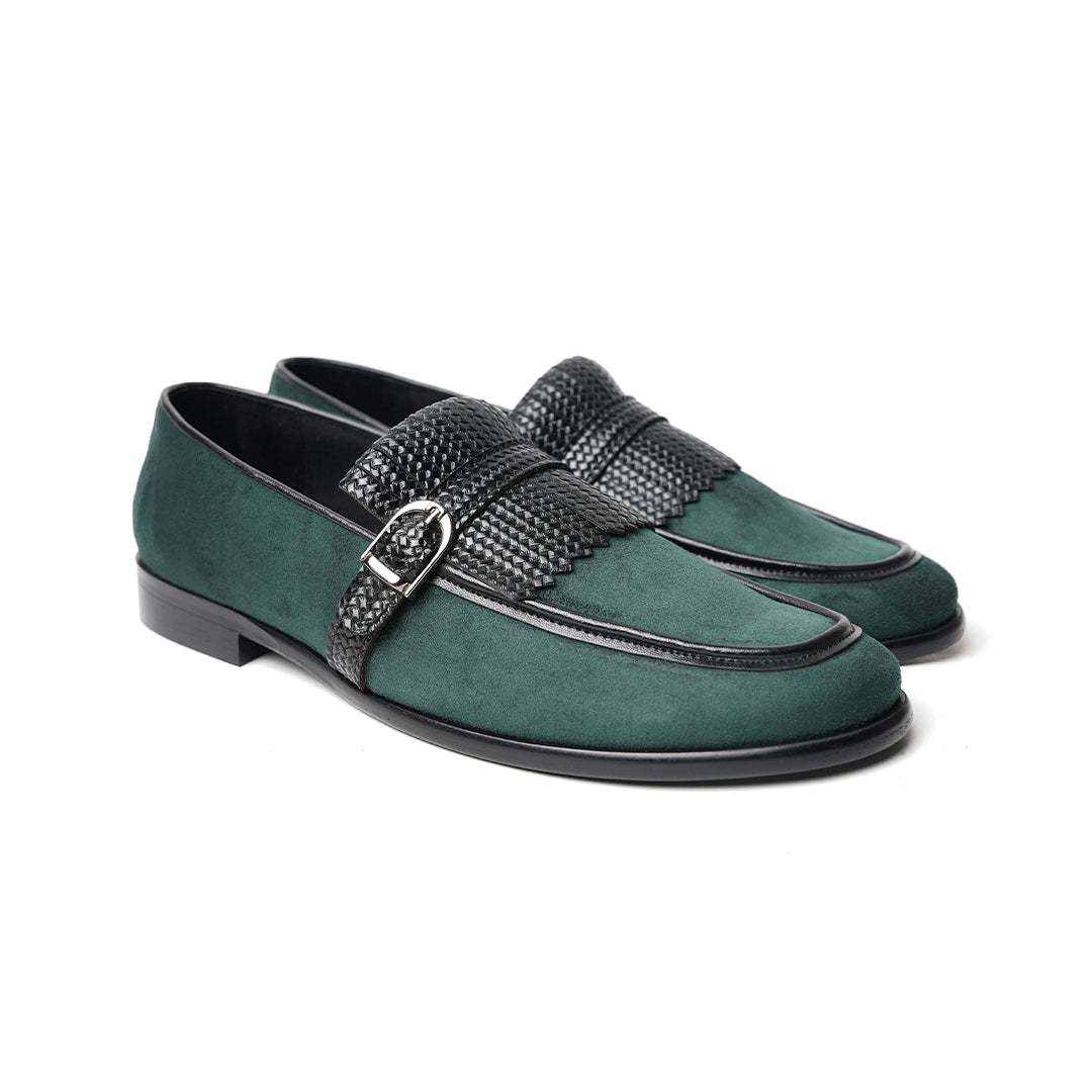 A Monkstory woven fringed slip-on with a bottle green suede and black buckle.