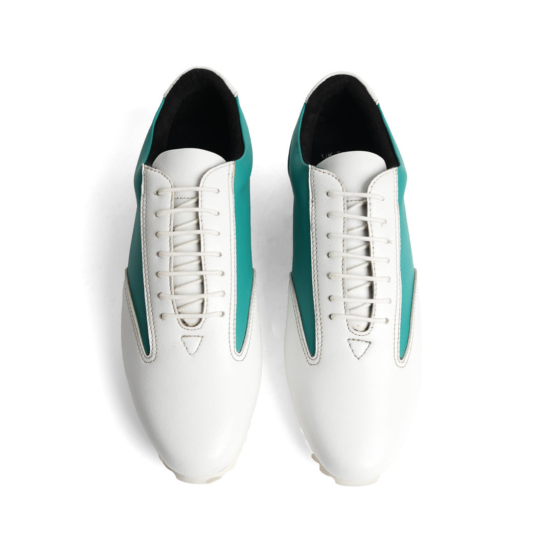 The Monkstory Dual Colour Smart Sneakers, in Teal Green & White, are a stylish and comfortable option for anyone in search of a sneaker with a white sole.