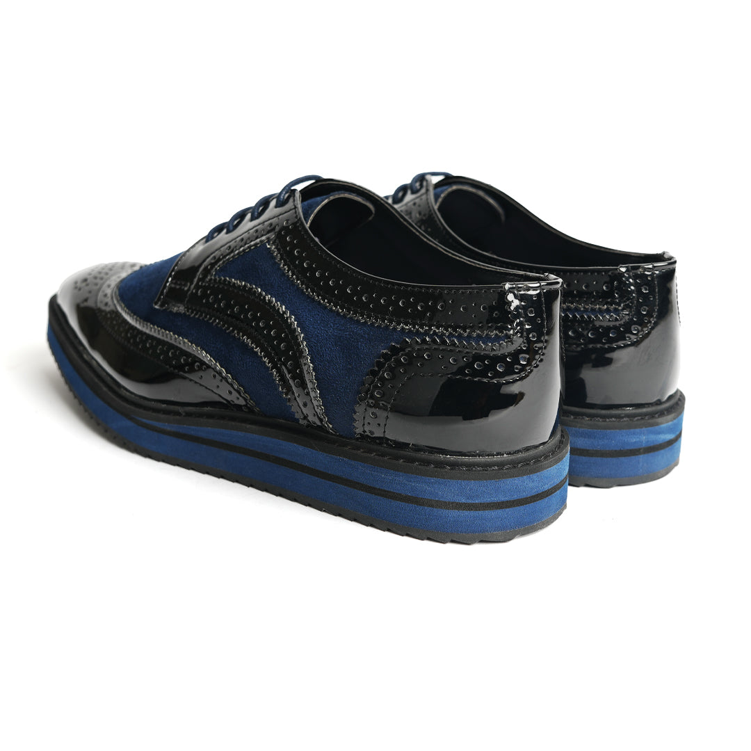 A stylish men's Monkstory Dual Colour Brogues - Glossy Black & Blue wingtip oxford shoe that elevates your fashion game.