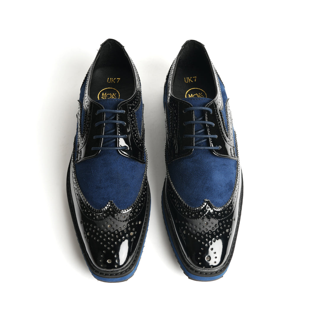 A stylish men's Monkstory Dual Colour Brogues - Glossy Black & Blue wingtip oxford shoe that elevates your fashion game.