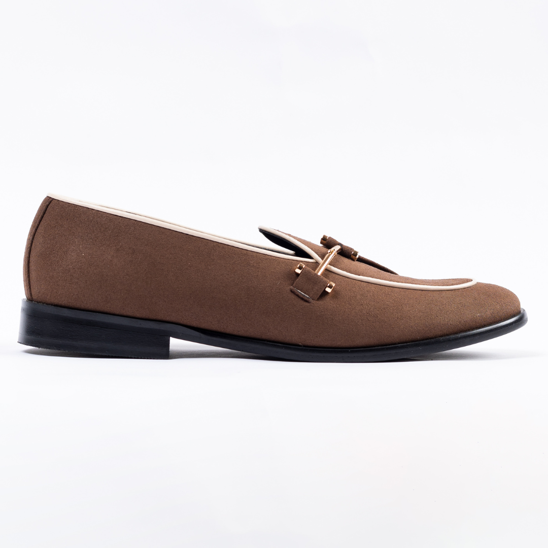 An Eclecta Suede Side Buckle Slip Ons in Classic Brown by Monkstory.