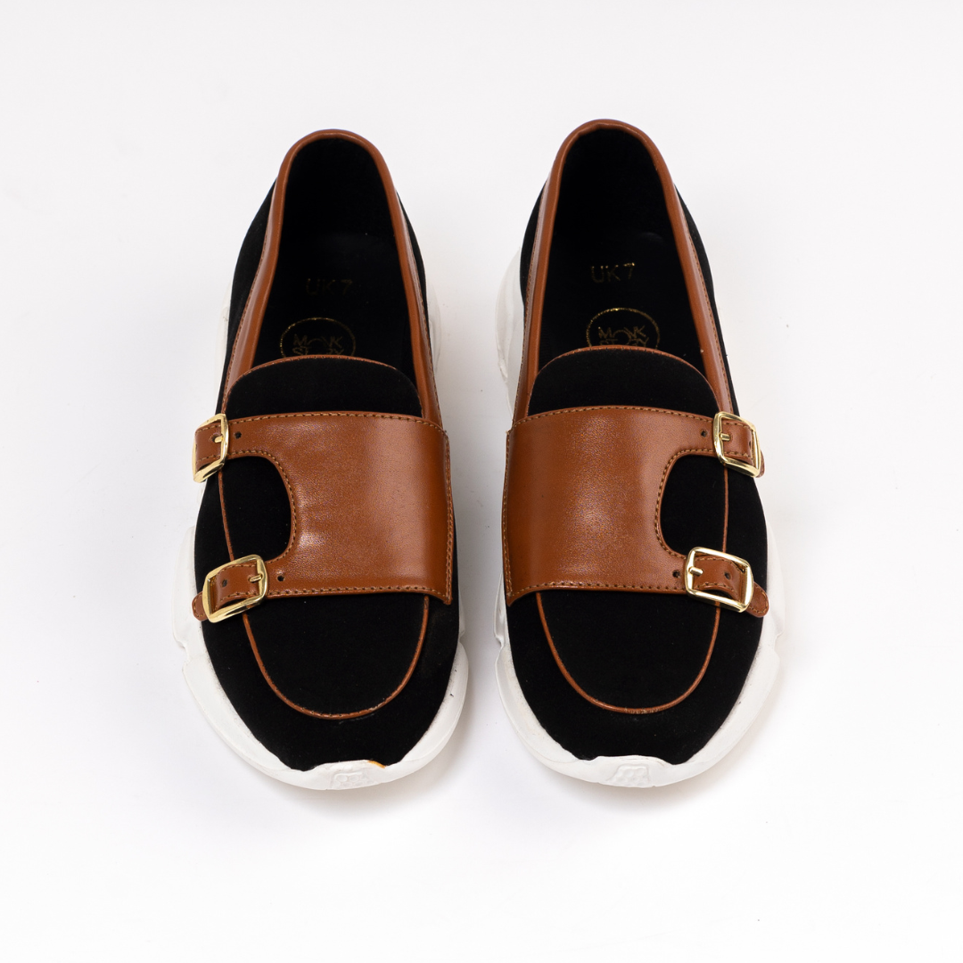 A monkstory Chunky Double Monk Sneaker in black and tan.