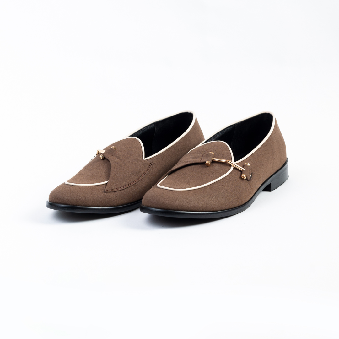 An Eclecta Suede Side Buckle Slip Ons in Classic Brown by Monkstory.