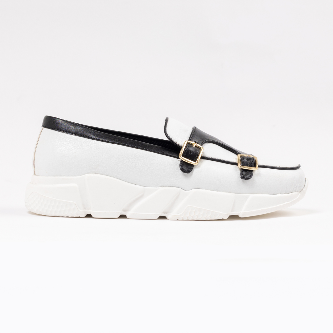 A stylish white/black Chunky Double Monk Sneaker from monkstory with two buckles.