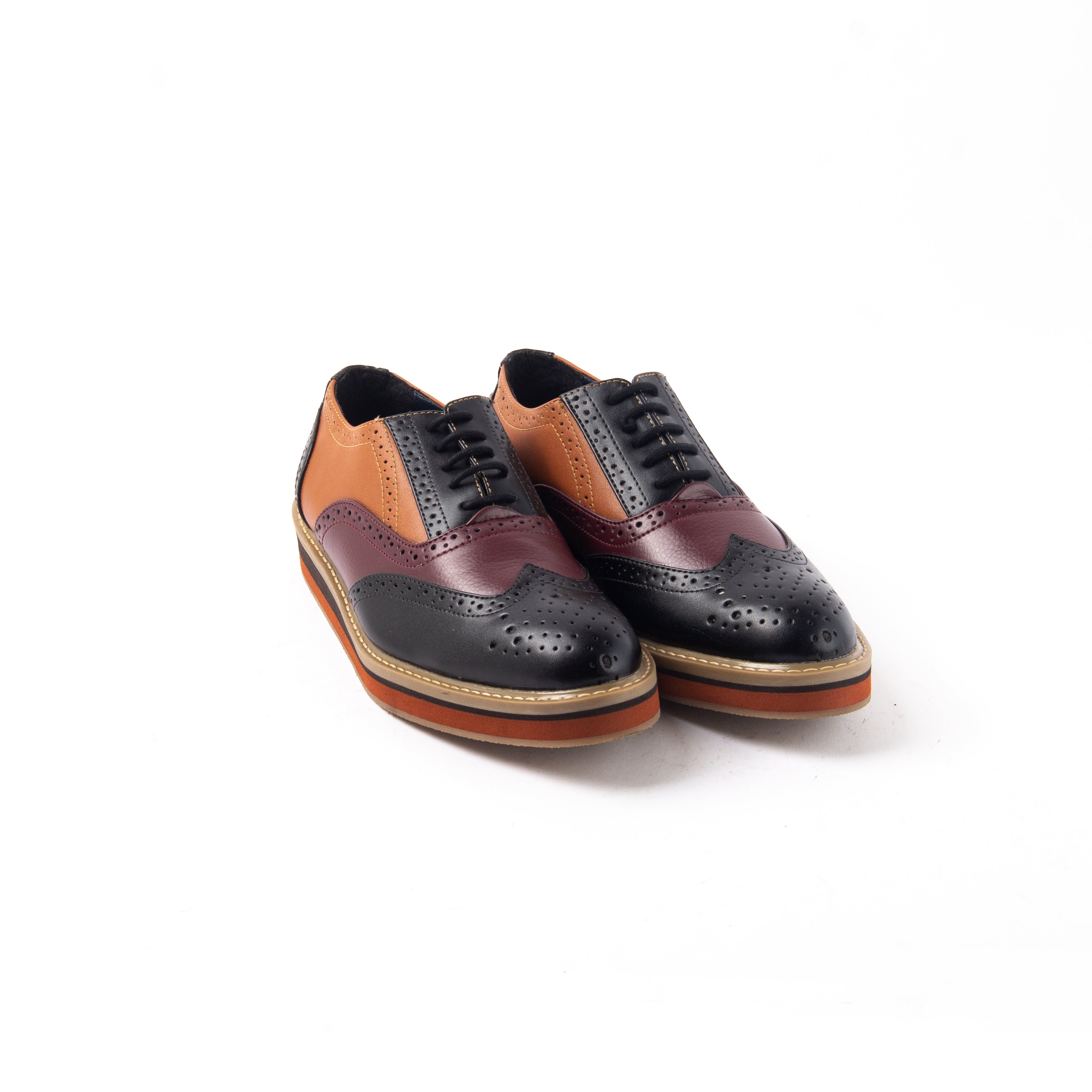 A fashion forward monkstory men's wingtip oxford shoe in black, orange and brown named Beverly Tricolour Brogues.