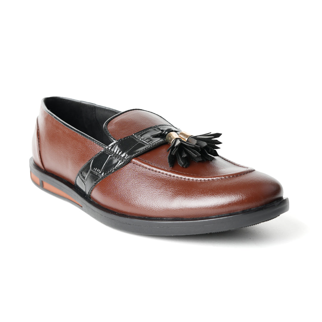 Flatform Metallic Tassel Slip Ons - Brown, by Monkstory, are a pair of loafers with faux leather.