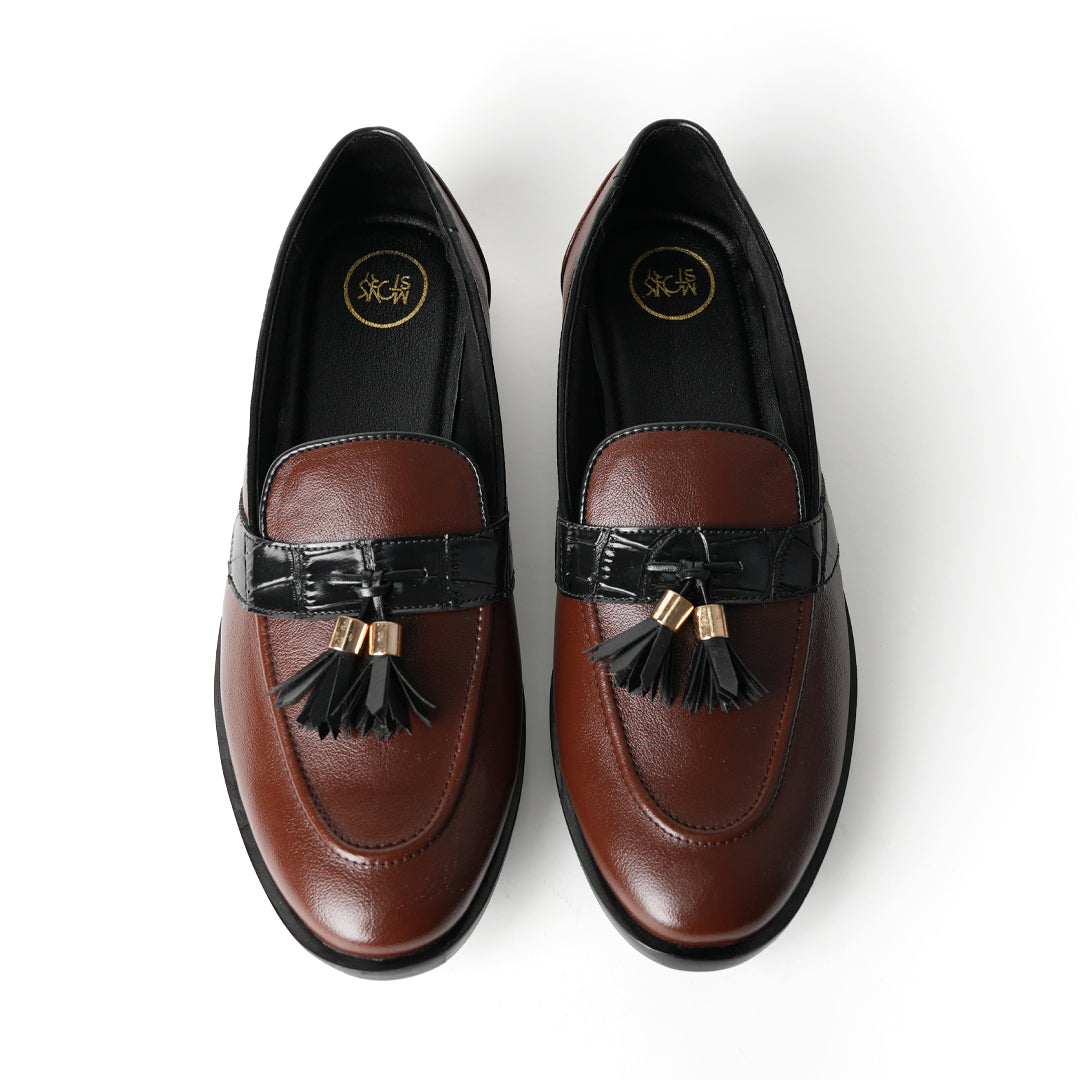 Flatform Metallic Tassel Slip Ons - Brown, by Monkstory, are a pair of loafers with faux leather.