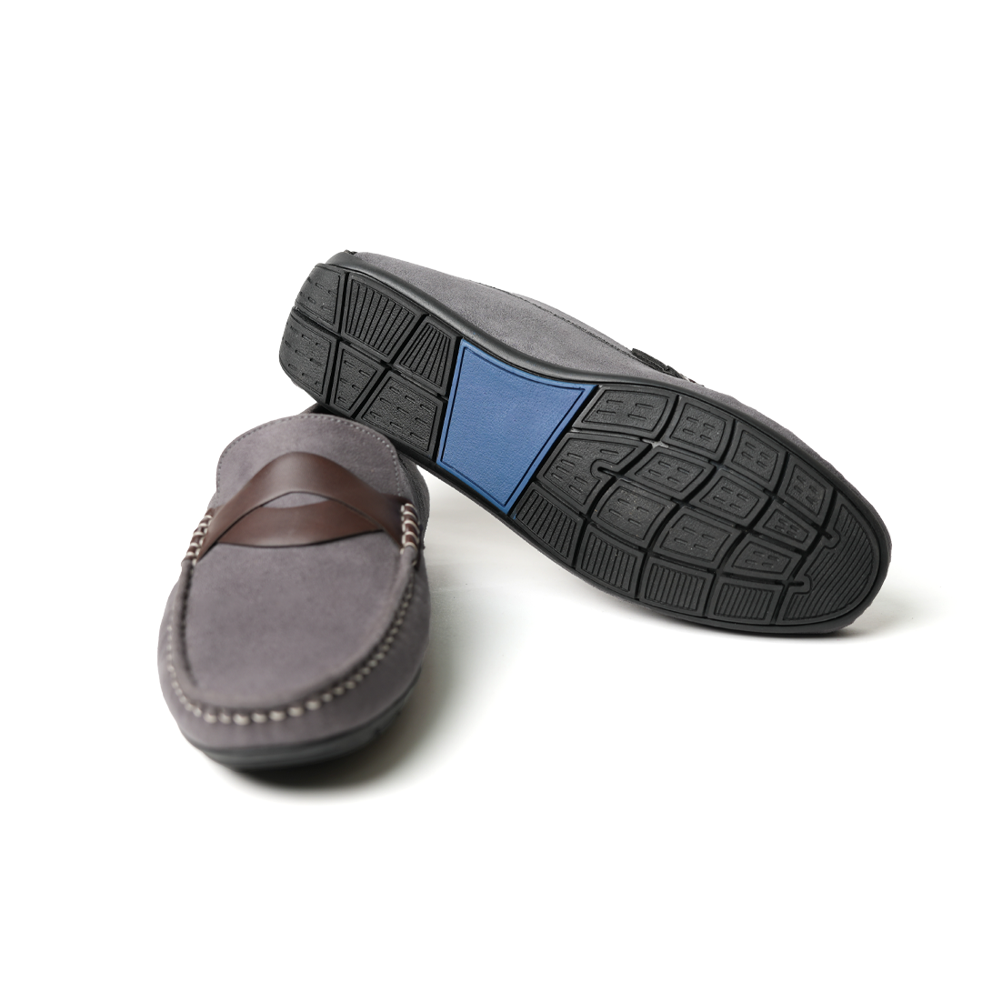 A pair of comfortable grey Stilo Driving Shoes with brown detailing, perfect for driving. Brand: MONKSTORY