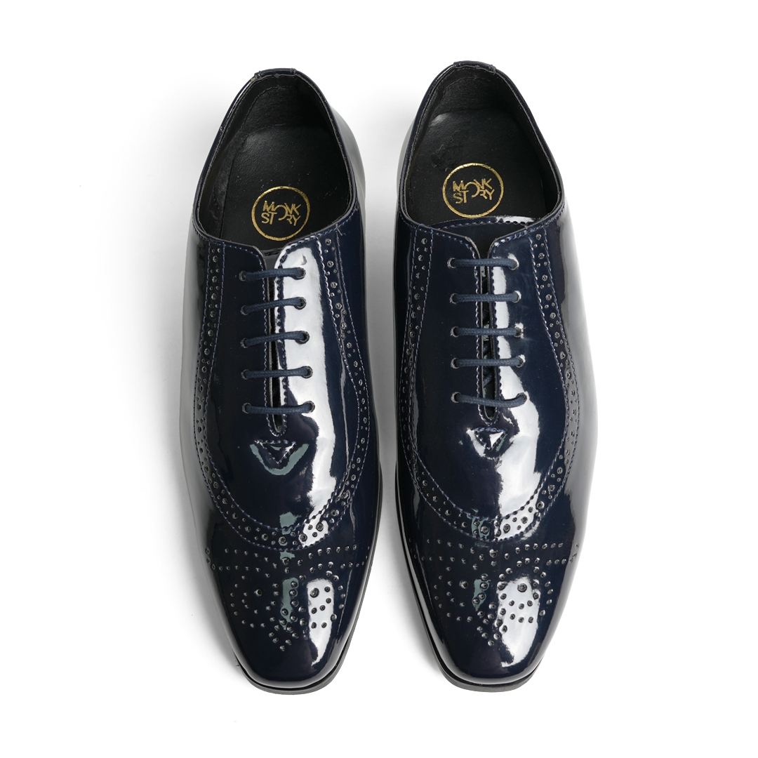 Monkstory's Glossy Classic Patent Oxford Lace-Ups - Blue are sophisticated men's wingtip shoes with rubberised soles.