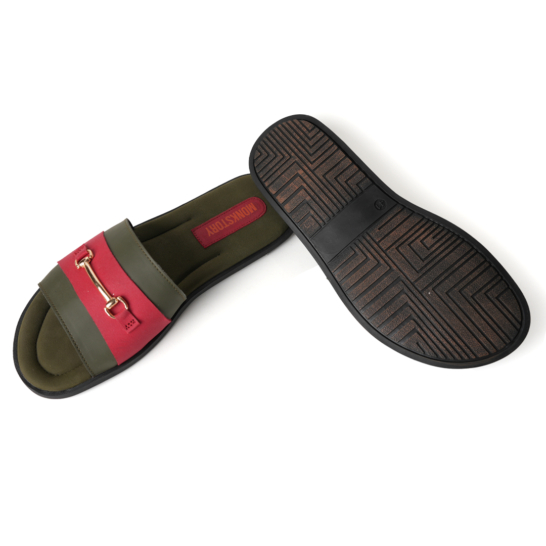 These stylish Horsebit Slides - Red from Monkstory feature a red and green color combination, adorned with gold buckles for added elegance. Offering both comfort and trendy aesthetics, they are perfect for casual outings or lounging by.