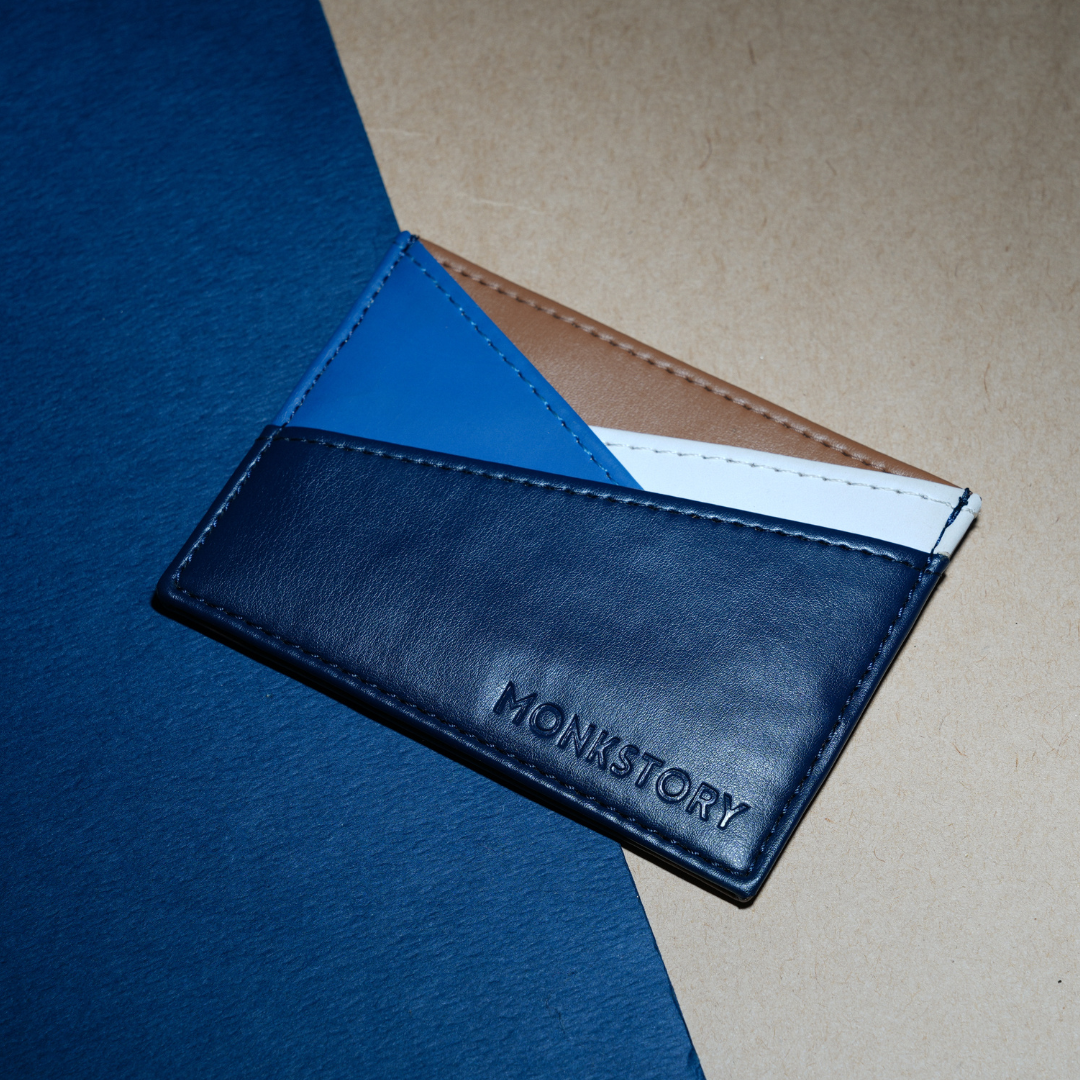 A blue and tan Monkstory Slim Colorblock Card Holder - Blue PU leather by monkstory.