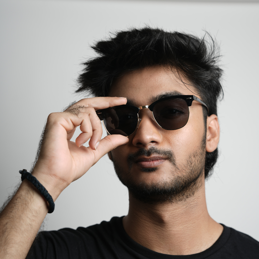 A stylish pair of Monkstory Urban Unisex Wayfarer Sunglasses in black and gold, featuring a UV400 rating, showcased on a white background.