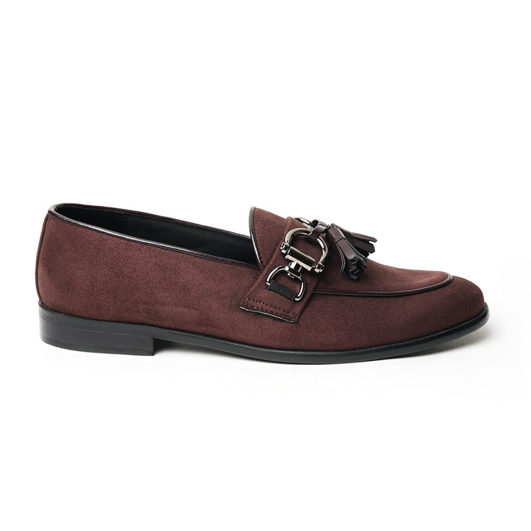 A timeless Monkstory brown loafer with tassels and a buckle, exuding modern sophistication.