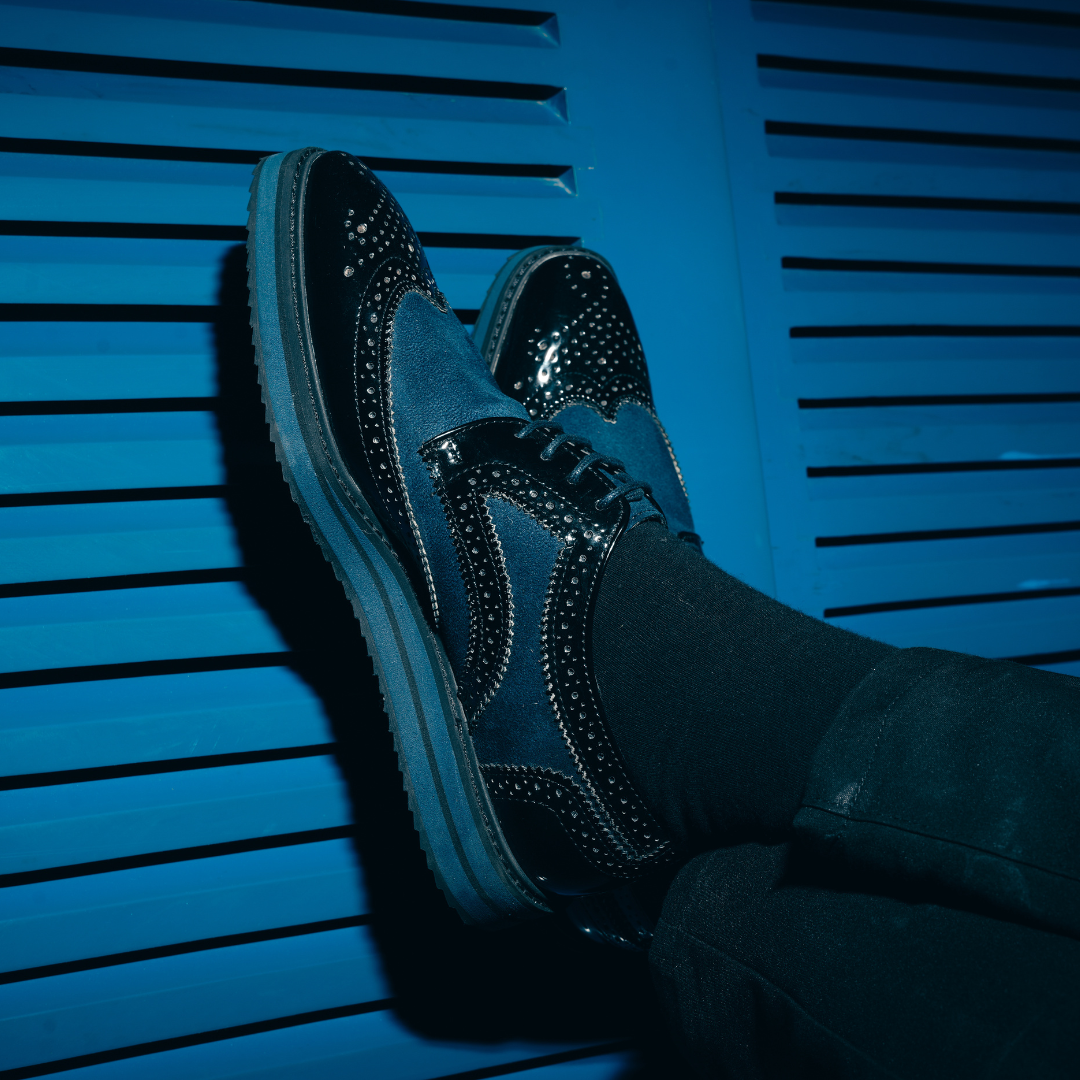 A stylish men's Monkstory Dual Colour Brogues - Glossy Black & Blue wingtip oxford shoe that elevates your fashion game.