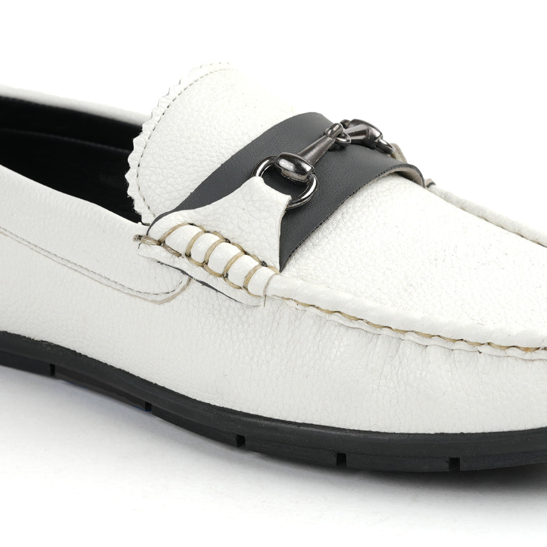 A stylish white Monkstory Horse-bit Driving Shoe with a sleek black buckle, perfect for both fashion-forward individuals and those seeking ultimate comfort.