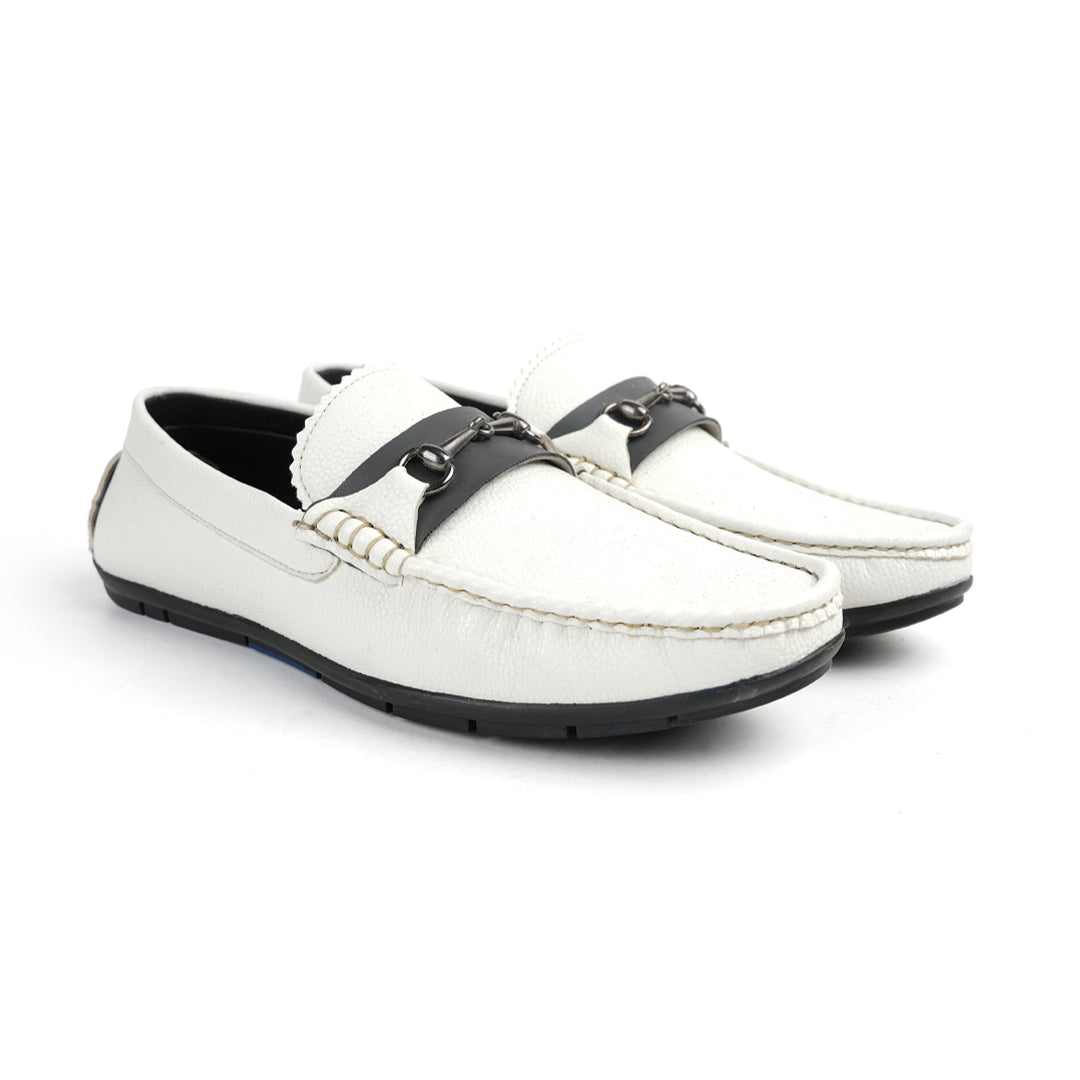 A stylish white Monkstory Horse-bit Driving Shoe with a sleek black buckle, perfect for both fashion-forward individuals and those seeking ultimate comfort.