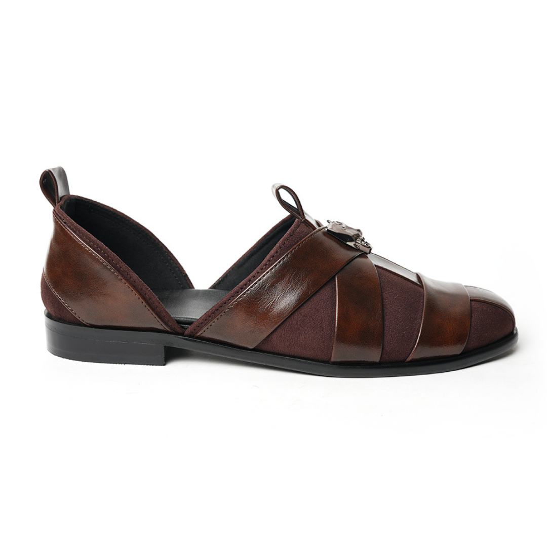 A pair of Monkstory Criss Cross Slip-On Sandals - Brown with elegant straps.