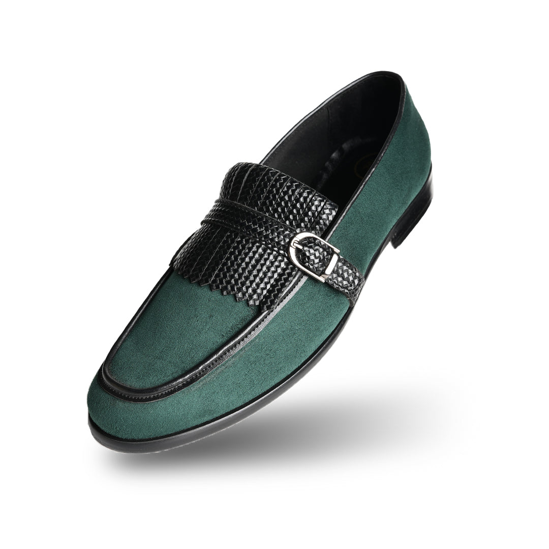 A Monkstory woven fringed slip-on with a bottle green suede and black buckle.