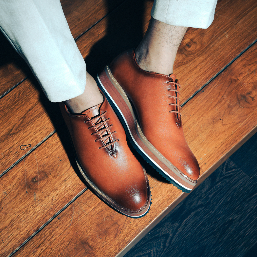 A versatile brown Oxford shoe with a modern twist, featuring a black sole. (product name: Monkstory Brown Oxford Casual Shoes, brand name: Monkstory)
