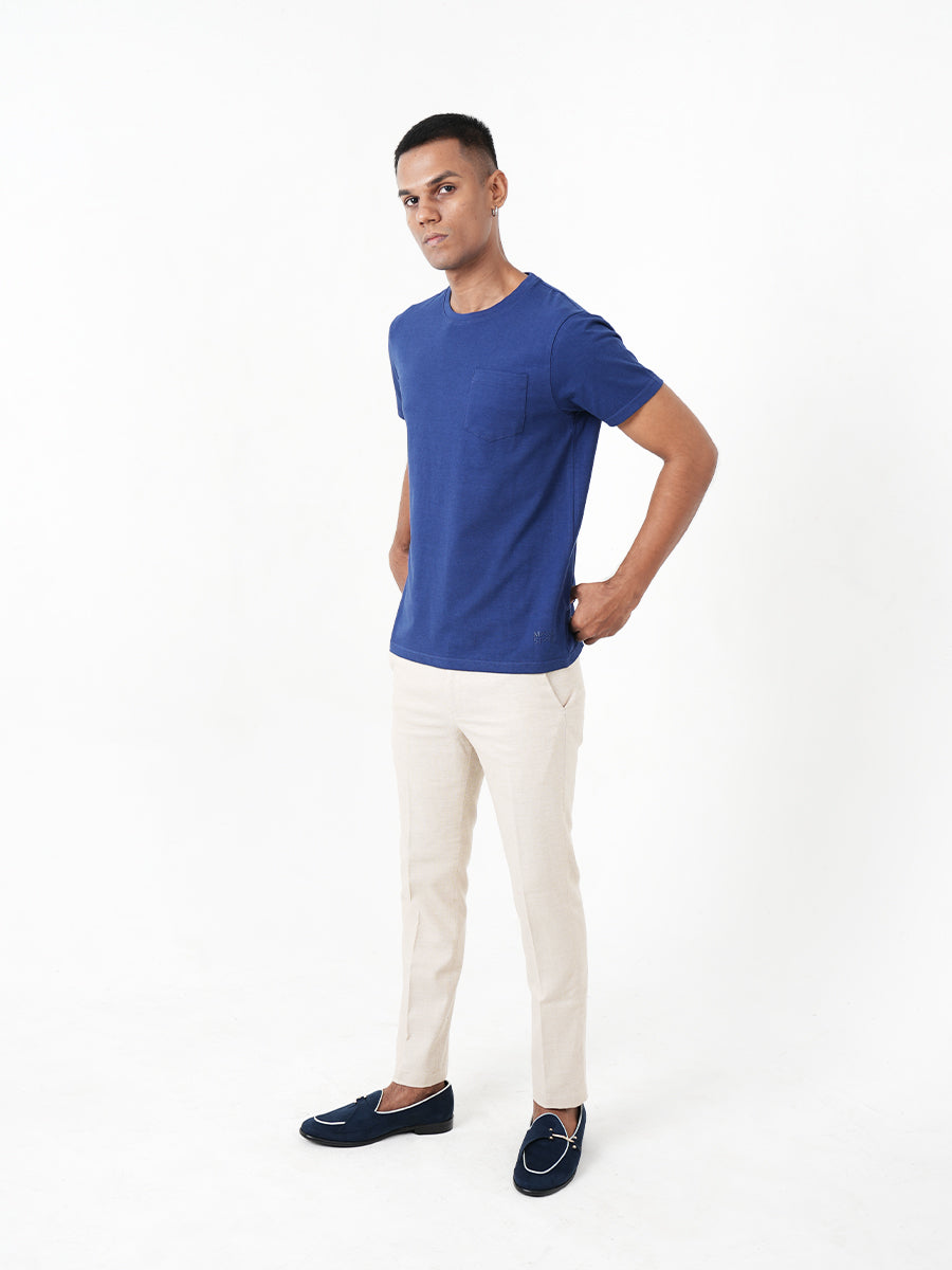 The Monkstory Bamboo Cotton Crew Tee, made of bamboo and cotton, features a man wearing a Midnight Blue t-shirt with a pocket.