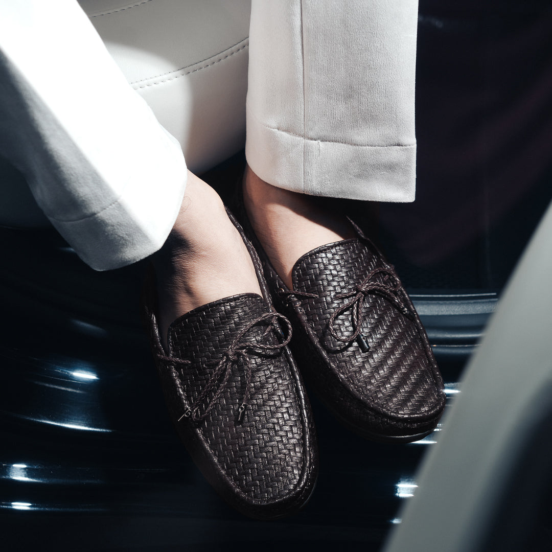 Monkstory men's brown woven loafer with tassels.