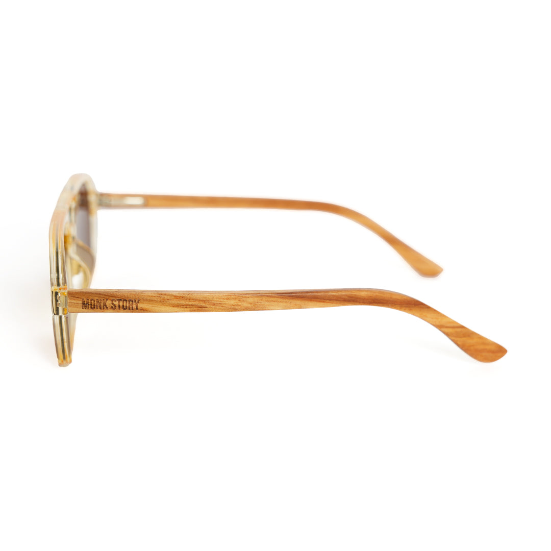 A pair of Monkstory Retro Wood Polarized Unisex sunglasses with transparent brown lenses on a white background.