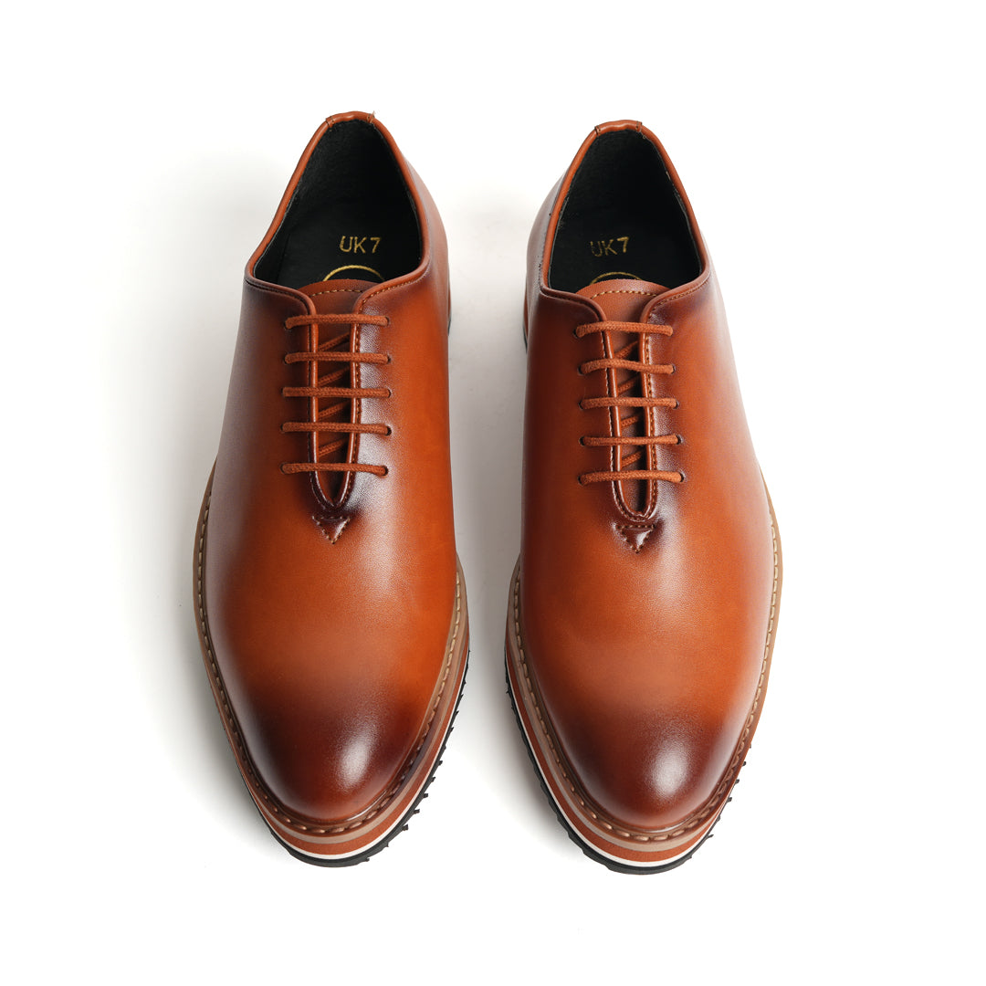 A versatile brown Oxford shoe with a modern twist, featuring a black sole. (product name: Monkstory Brown Oxford Casual Shoes, brand name: Monkstory)