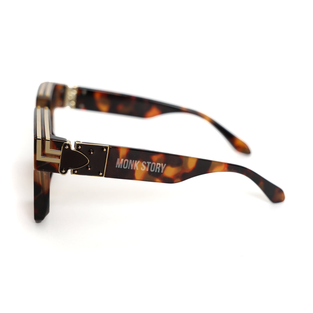 A pair of Monkstory Millionaire Unisex Wayfarer Sunglasses - Tortoise with polarized lenses.