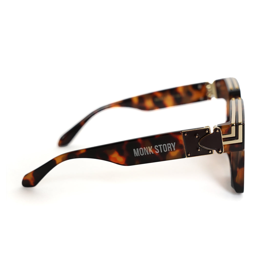 A pair of Monkstory Millionaire Unisex Wayfarer Sunglasses - Tortoise with polarized lenses.