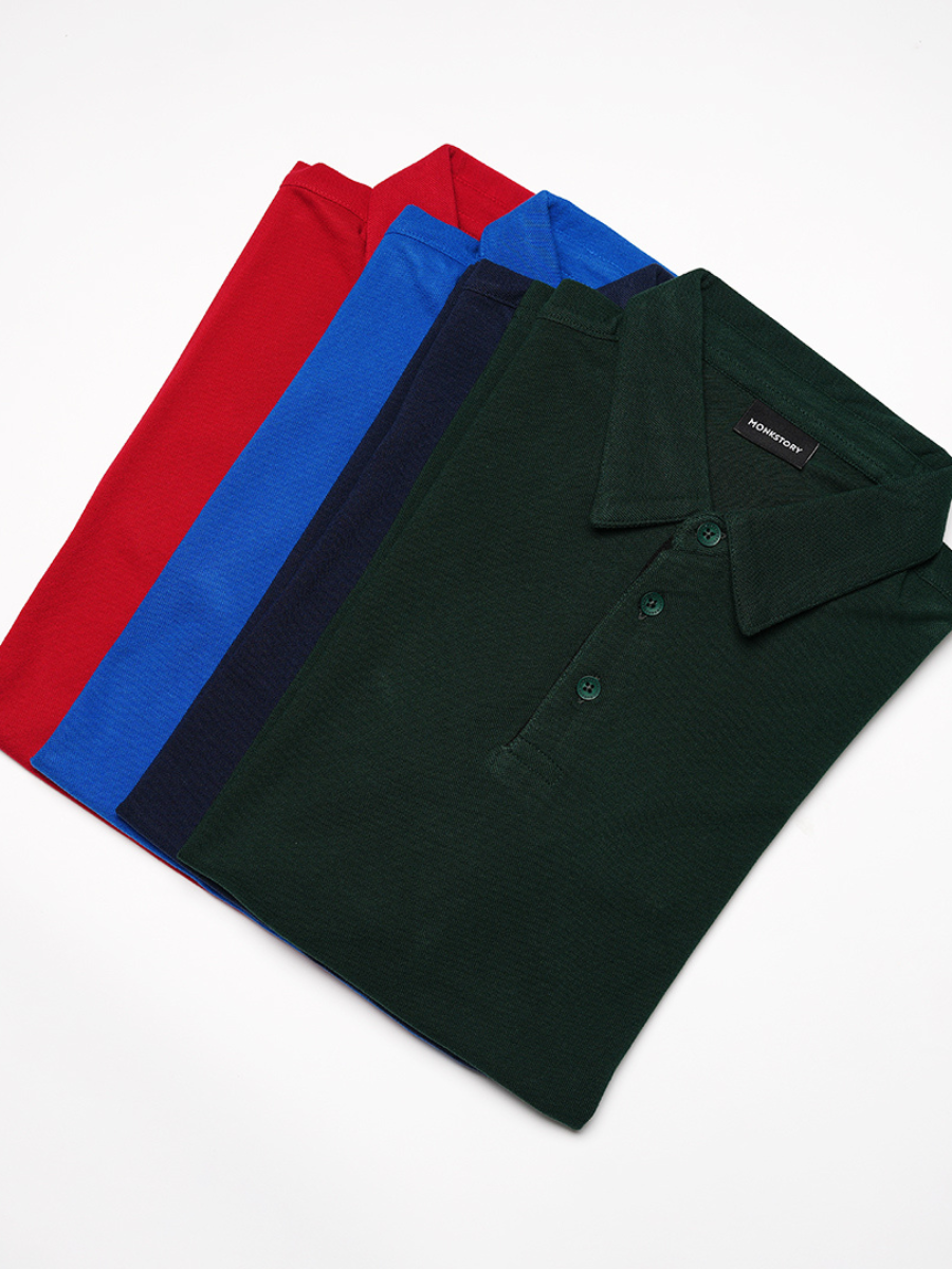 A man wearing a Monkstory Bamboo Cotton Polo Tee - Pine Green, a versatile option from Monkstory.